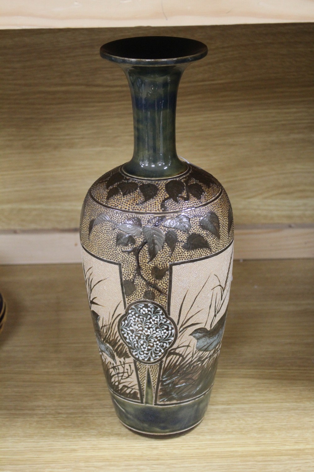 Florence E Barlow for Doulton Lambeth, a large pate sur pate partridge vase, dated 1884, 38.5cm, neck restoration